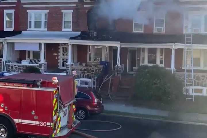 Firefighters Battle Morning Row Home Fire In Baltimore