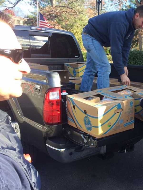 Greenwich Firefighters Deliver Thanksgiving Baskets To Comrades' Widows