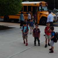 <p>Students arrive for the first day of school in Tappan.</p>