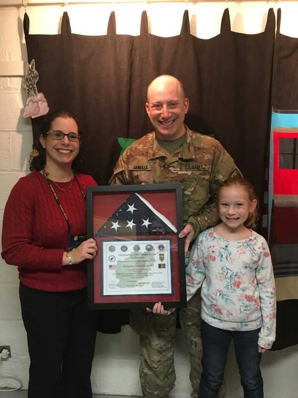 Army Captain Presents Flag To Roaring Brook Elementary