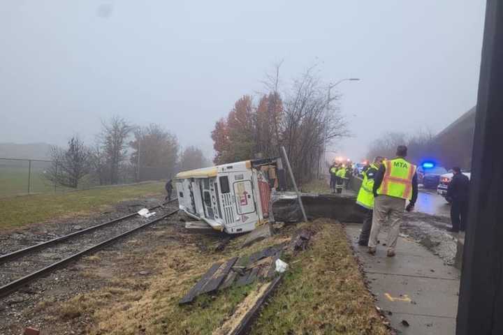 Bus Overturns, Crashes Off Embankment Near Railroad Tracks In Maryland: Fire Union (DEVELOPING)