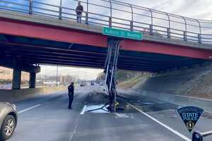 Damage Control: Crews Assess Newton Bridge After Truck Barely Scrapes By