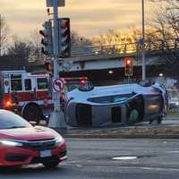 <p>A car flipped over on Revere Beach Parkway in Chelsea on Monday morning, Jan. 30</p>