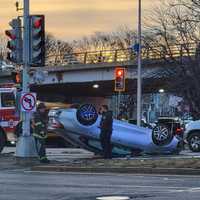 <p>A car flipped over on Revere Beach Parkway in Chelsea on Monday morning, Jan. 30</p>