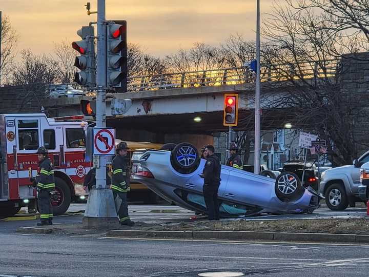 A car flipped over on Revere Beach Parkway in Chelsea on Monday morning, Jan. 30