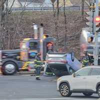 <p>A car flipped over on Revere Beach Parkway in Chelsea on Monday morning, Jan. 30</p>