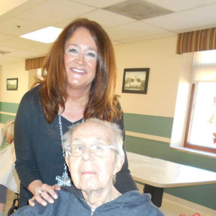 Niki Folina with Anthony Felicito, a resident at Schervier Pavilion.