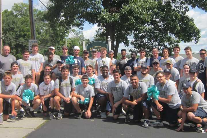 Burke Catholic Football Team Tackles Ovarian Cancer In Goshen