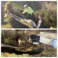 Photos Show Responders Lifting Tractor Trailer Driver 75 Feet To Roadway After Route 202 Crash