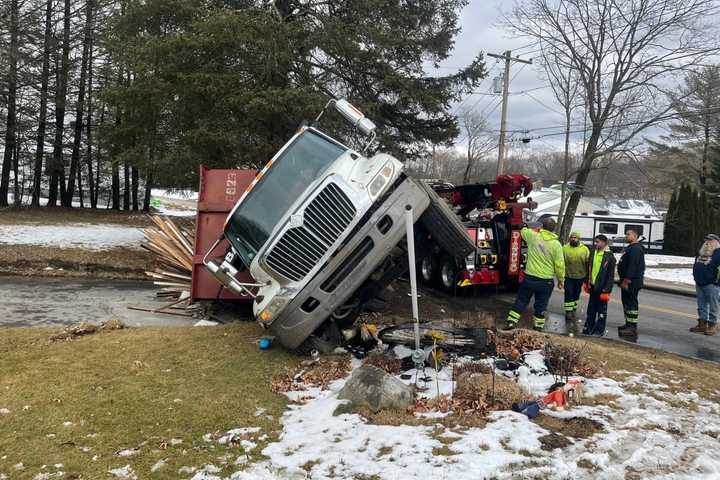 Auburn Road 'Impassable' Following Dump Truck Rollover Crash: Police