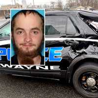 <p>Harry Berkshire III, along with Wayne Police Officer Kimberly Fryer&#x27;s police cruiser.</p>