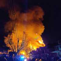 <p>Hundreds of people gathered on local streets as the massive blaze lit up the night.</p>