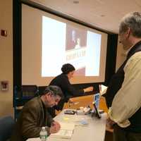 <p>Westport author Eric Burns signs copies of his latest book, &quot;The Golden Lad,&quot; at Westport Library.</p>