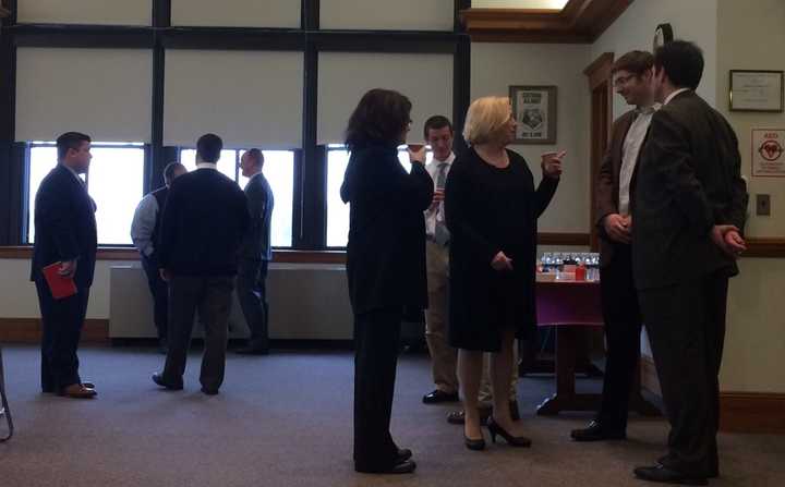 Bergen County school officials mingle before a discussion on educational issues Wednesday.