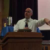 <p>Saddle Brook High School/Middle School Principal John Lawlor talks to students about voting Tuesday, Oct. 20.</p>