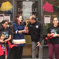 <p>Danielle Peyton and Cliffside Park Mayor Thomas Calabrese cut the ribbon on her new studio.</p>