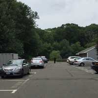 <p>Norwalk police tape is set up and officers are searching Friday in the area of the Rowayton Woods condo complex for a suspect involved in a possible attack on a teenaged girl.</p>