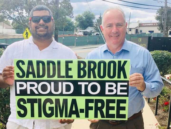 Saddle Brook resident Ryan Roy poses with Mayor Robert White.