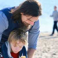 <p>People of all ages take the plunge at the 10th annual Polar Plunge at Westport&#x27;s Compo Beach.</p>