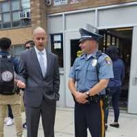 <p>SBPD School Resource Officer Christopher Stanton talking with Principal John Lawlor.</p>