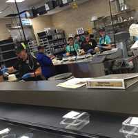 <p>Putting the icing on the cake -- literally -- at Wegmans in Montvale.</p>