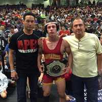 <p>Bergen Catholic&#x27;s Nick Suriano with coach Damion Logan, left, and his father, Bob Suriano.</p>