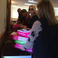 <p>Volunteers drop off toys at the American Legion Riders Post 174 building in Wayne Saturday, Nov. 14.</p>