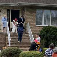 Passaic Florist Stops To Gift Bouquet To Bride, Groom Getting Married On Front Steps