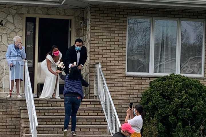 Passaic Florist Stops To Gift Bouquet To Bride, Groom Getting Married On Front Steps