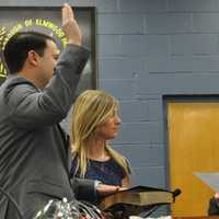 <p>Anthony Chirdo (left) sworn in as new councilman in Elmwood Park.</p>