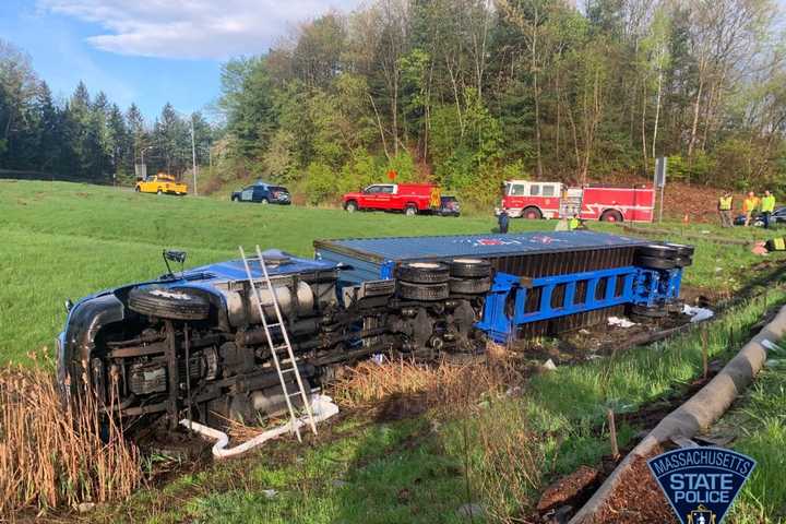 Tractor-Trailer Flips On Side After Rolling Off Mass Pike In Central Mass: Police