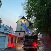 <p>Fire and smoke billowed out through the building&#x27;s roof.</p>