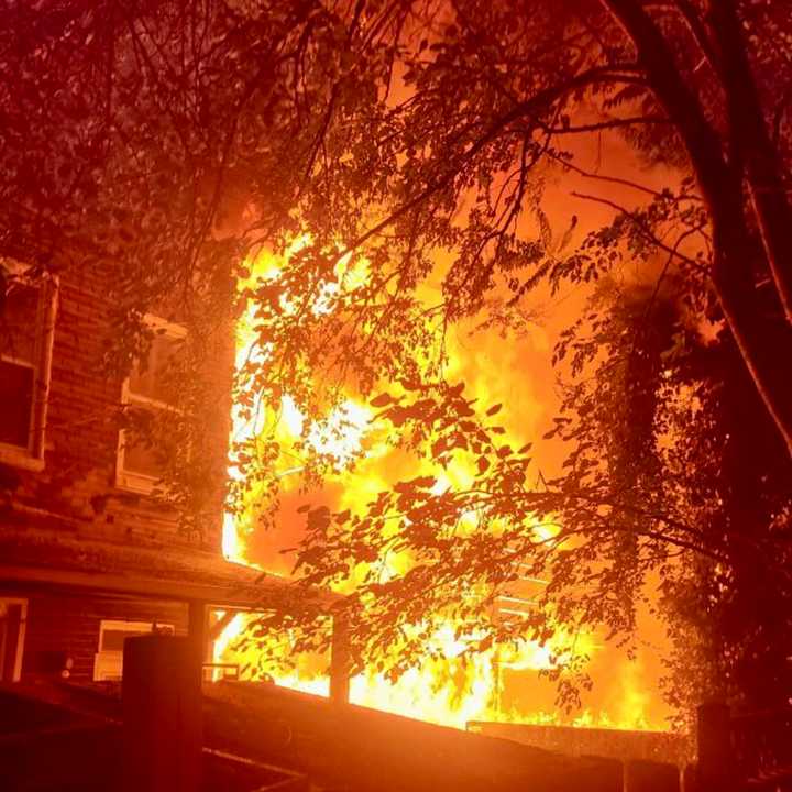 The fire damaged three homes.