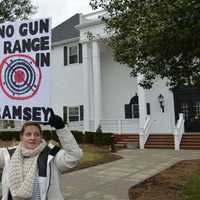 <p>Demonstrators waved their signs at passing motorists in Ramsey Wednesday morning.</p>