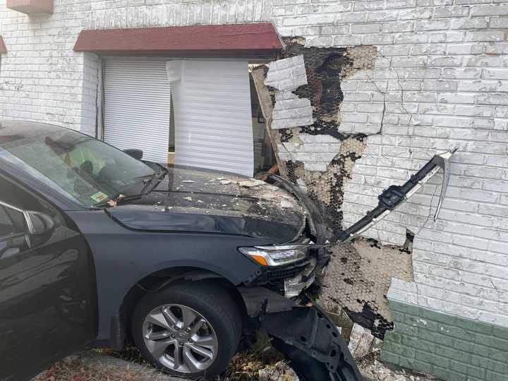 The driver crashed into the side of the doughnut shop in Laurel.