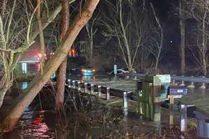 Driver Rescued By Boat After Being Swept Away By Montgomery County Flood Waters