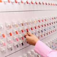 <p>A nail polish wall at a GLOSSLAB studio</p>