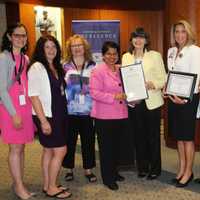 <p>Hospital officials, staff and county leaders celebrating at the Breastfeeding Friendly Worksite ceremony. (See article for those shown here.)</p>