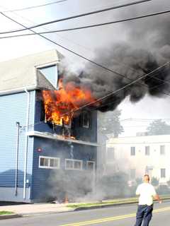 PHOTOS: Firefighters Douse Roaring House Blaze