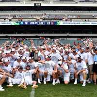 Fairfield U Athletic Director Presents UNC Lacrosse Squad With Trophy