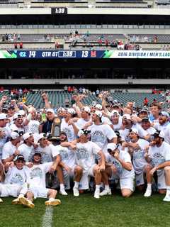 Fairfield U Athletic Director Presents UNC Lacrosse Squad With Trophy