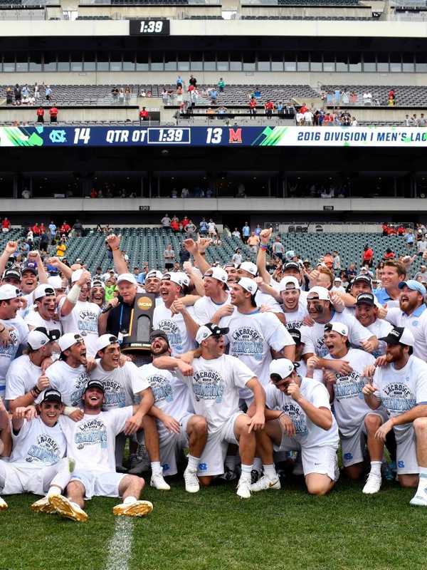 Fairfield U Athletic Director Presents UNC Lacrosse Squad With Trophy