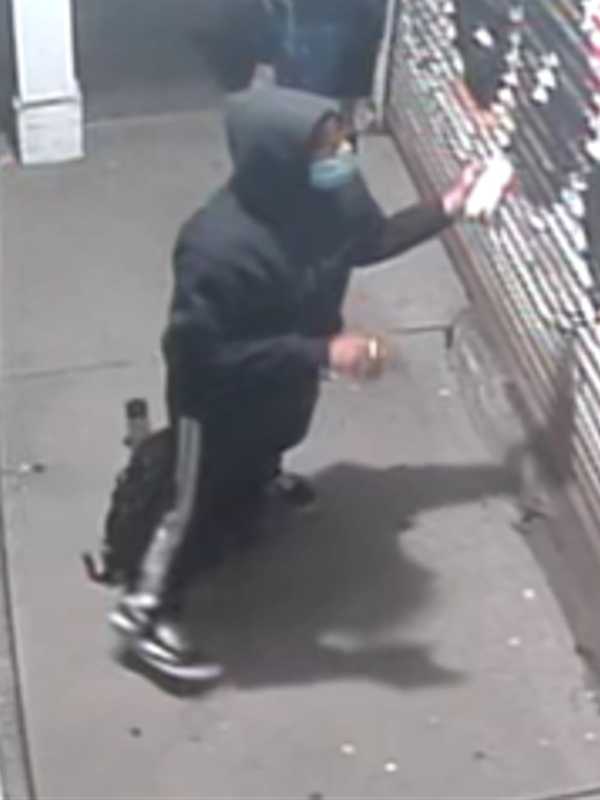Police Searching For Duo Who Spray-Painted Suffolk County Liquor Store