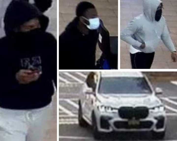 Authorities are searching for three men who are accused of using stolen credit cards at two businesses on Long Island.