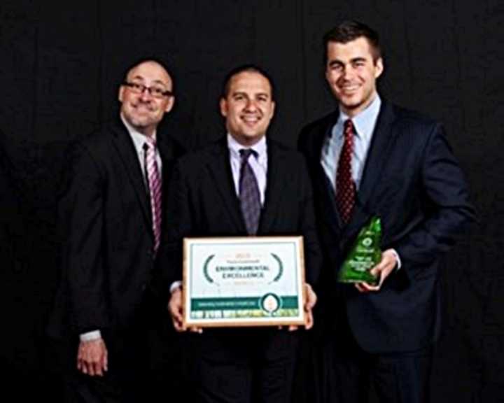 (from left) Ken Haber, Kyle Tafuri and Jose Lozano accepted the Greenhealth award at a May 19 ceremony.