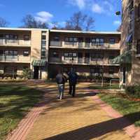 <p>Two Greenwich firefighters deliver Thanksgiving baskets.</p>