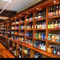 <p>Growler &amp; Gill&#x27;s famed &quot;Wall of Beer&quot; where customers can sample unfamiliar brews by mixing up their own six-packs.</p>