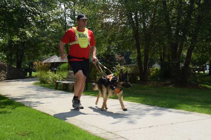 Guiding Eyes For The Blind Graduates First Running Dog 