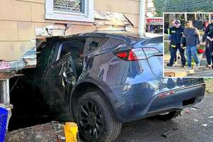 BAM! Tesla Plows Halfway Into New Milford Basement (w/PHOTOS)