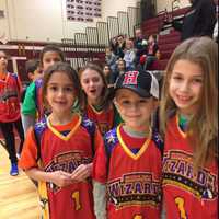 <p>Harrison teachers took on the Harlem Wizards on Jan. 14 during a fundraising basketball game that collected money for several programs and clubs.</p>